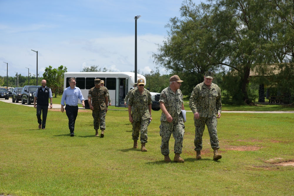 The Commanding Officer of Naval Base Guam leads a tour