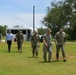 The Commanding Officer of Naval Base Guam leads a tour