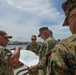 Adm. Grady learns about base capabilities during a tour of Guam.