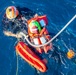 GMSN Guillen Secures a Simulated Man Overboard to a Rescue Strop