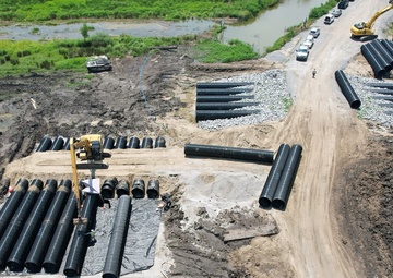 Construction of the CMP access road crossing of the existing drainage canal is underway at WSLP contract 107.
