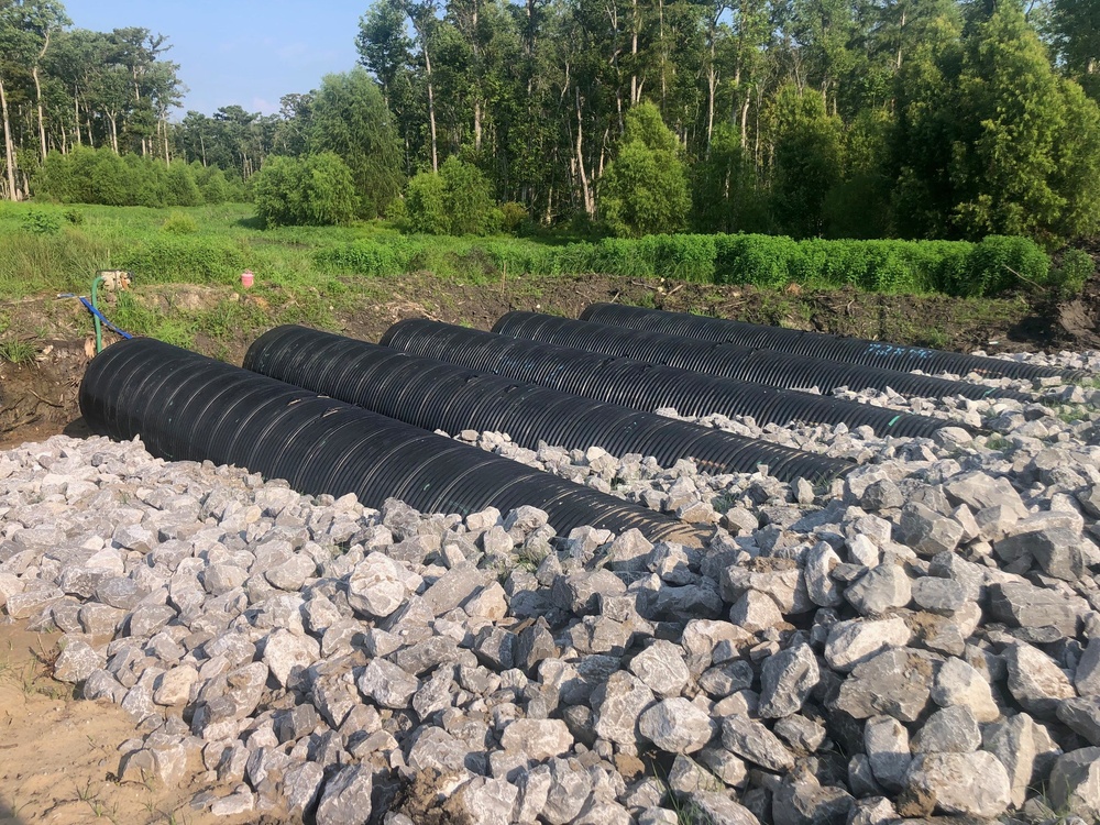 Construction of the CMP access road crossing of the existing drainage canal is underway at WSLP contract 107.