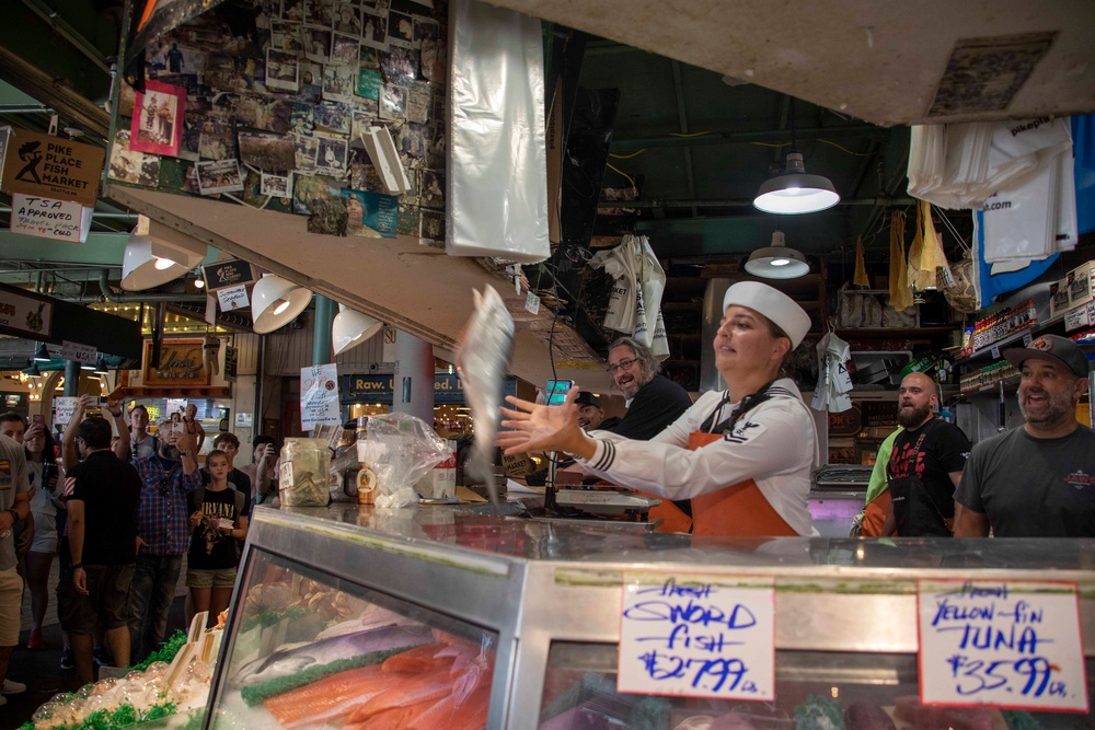 Sailors visit Pike Place Market during Seattle Fleet Week