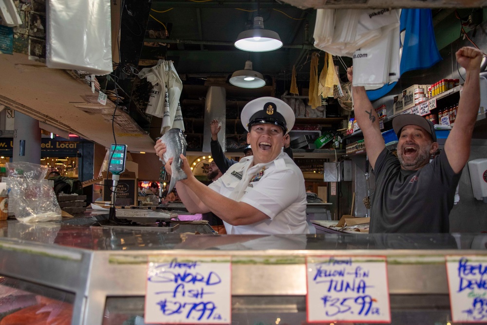 Sailors visit Pike Place Market during Seattle Fleet Week