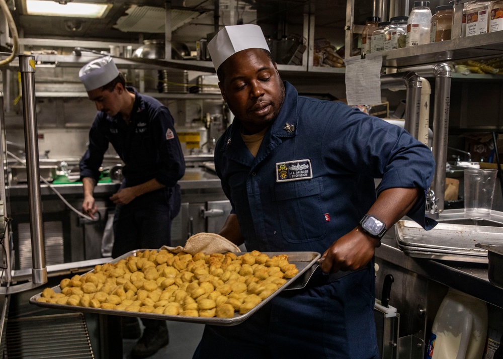 Sailors Prepare a Meal Aboard USS John Fin (DDG 113)