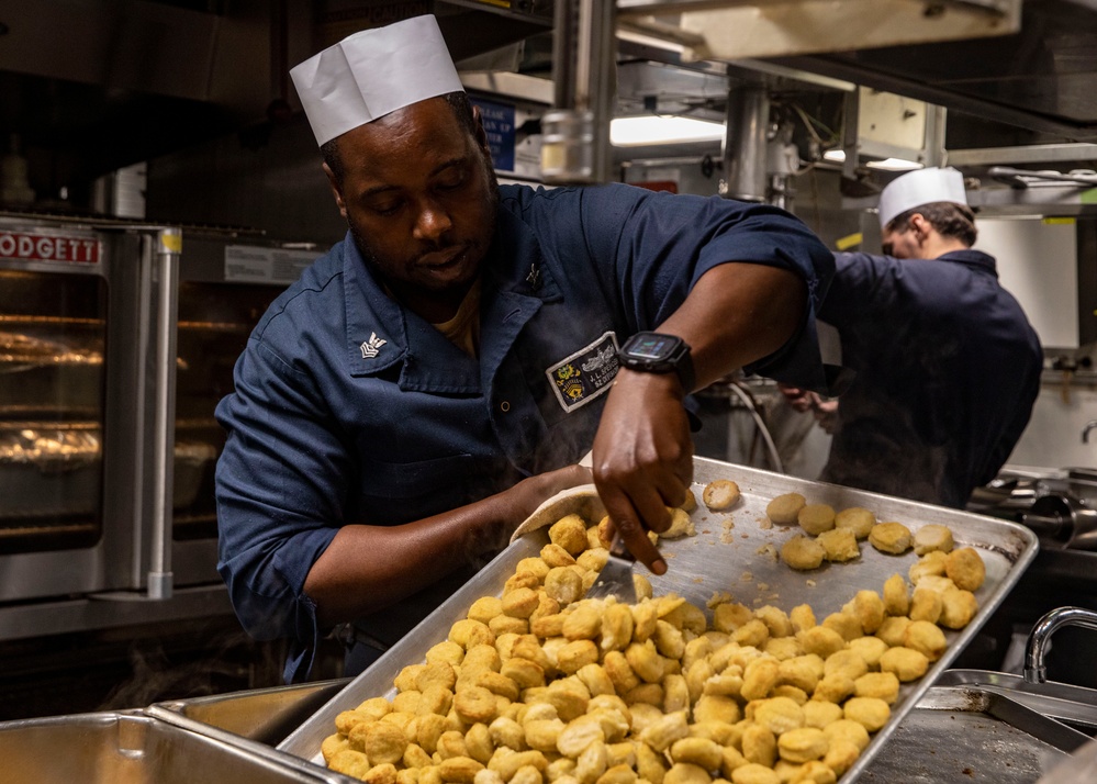 Sailors Prepare a Meal Aboard USS John Fin (DDG 113)