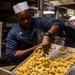 Sailors Prepare a Meal Aboard USS John Fin (DDG 113)