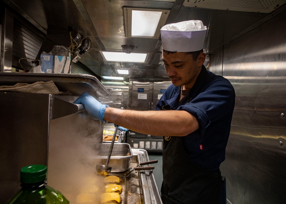 Sailors Prepare a Meal Aboard USS John Fin (DDG 113)