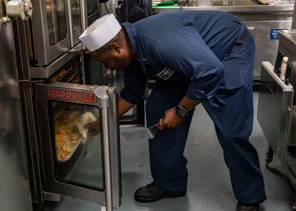 Sailors Prepare a Meal Aboard USS John Fin (DDG 113)