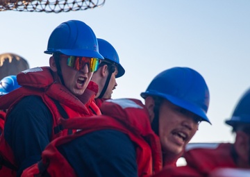 Lt. j.g. Posdnyakov Heaves a Line Aboard (SS Antietam (CG 54)