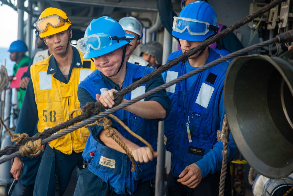 SN Henderson Removes Stoppers from a Span Wire Aboard USS Antietam (CG 54)