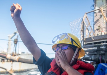 BMSN Burton Shouts a Command Aboard USS Antietam (CG 54)