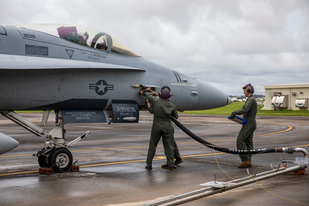 Topping Off; VMFA-115 conducts hot pit refueling at MCAS Futenma