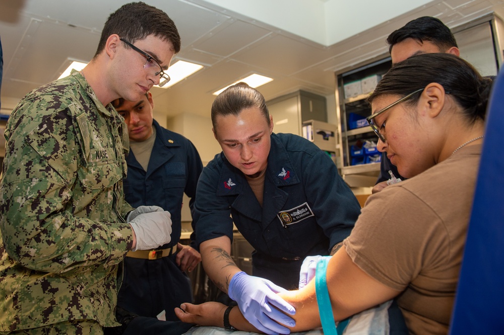 USU Students Receive Operational Medicine Training Onboard USS Boxer (LHD 4)