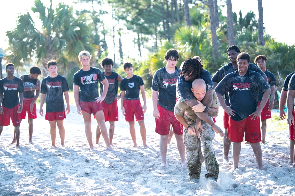 Investing In Our Next Generation: Air Commandos partner with FWBHS football program to build expert teams