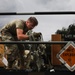 Airmen from the 87th and 721st Aerial Port Squadrons move explosive cargo at Ramstein Air Base, Germany