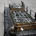 Airmen from the 87th and 721st Aerial Port Squadrons move explosive cargo at Ramstein Air Base, Germany