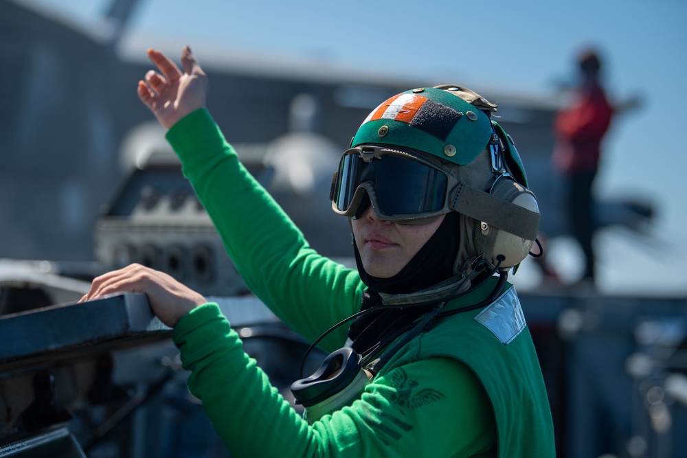 USS Ronald Reagan (CVN 76) Sailors conduct daily operations