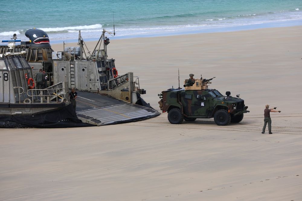 31st Marine Expeditionary Unit Directs Vehicles During Amphibious Landing