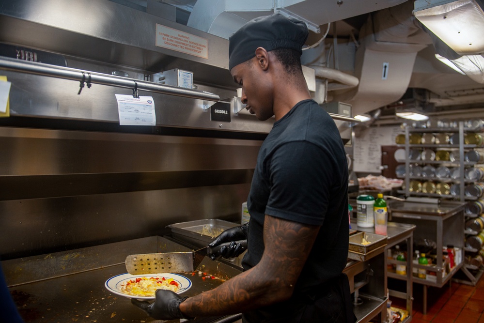 USS Ronald Reagan (CNV 76) Sailors prepare breakfast in the wardroom