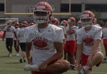 U.S. Marines work out with Mater Dei High School football team