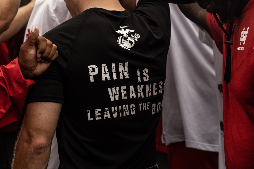 U.S. Marines work out with Mater Dei High School football team