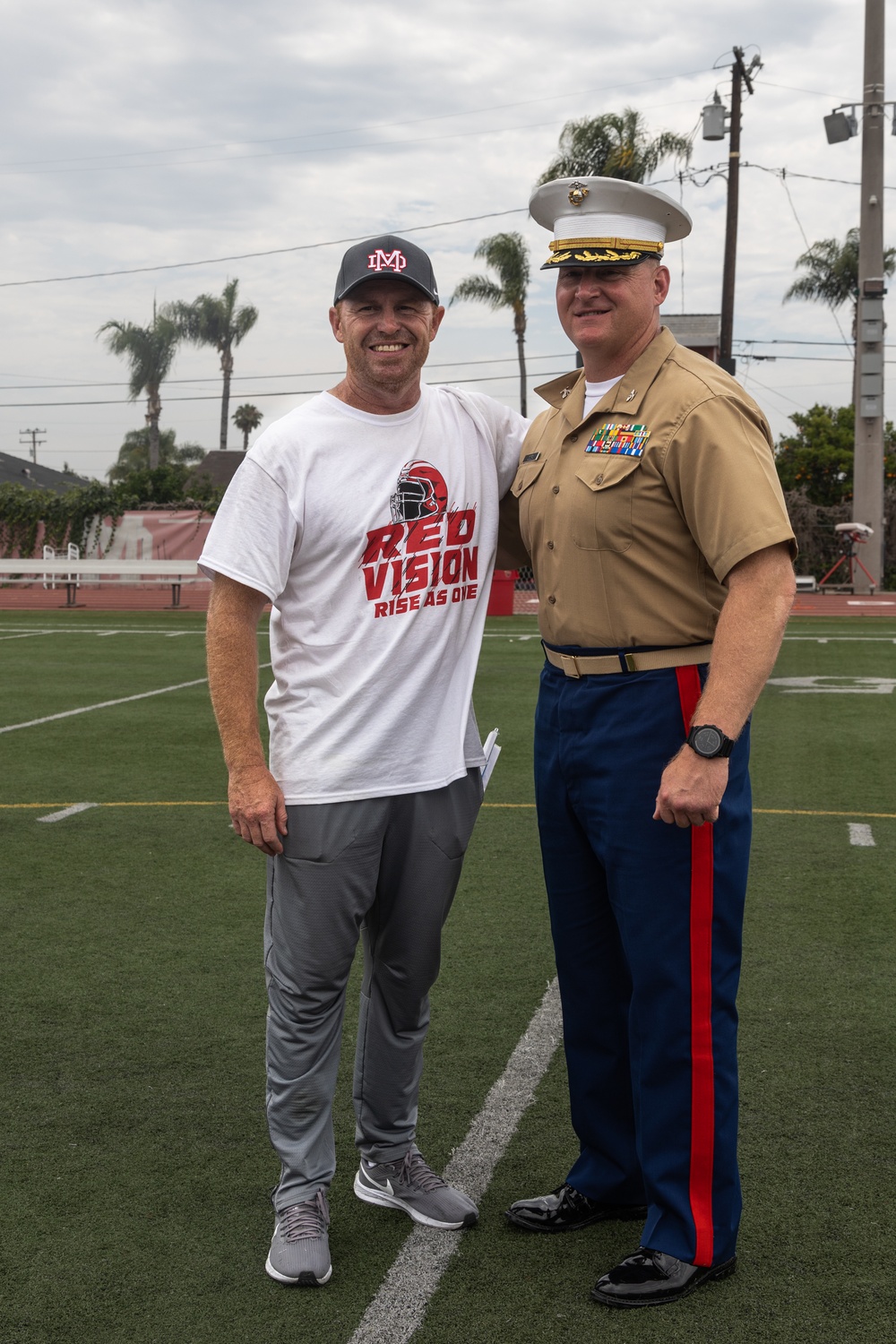 U.S. Marines work out with Mater Dei High School football team