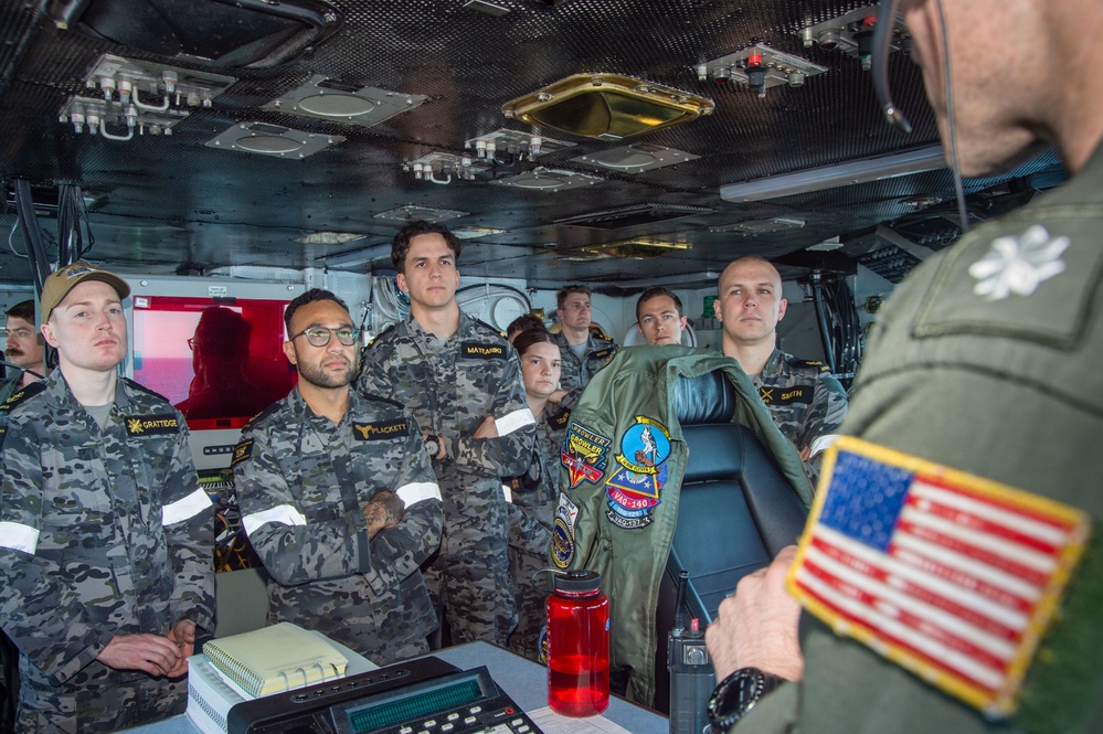 USS Ronald Reagan (CVN 76) hosts Royal Australian Navy sailors from HMAS Perth (FFG 157)