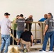 Local Voluntary Agencies Collaborate with Mennonite Disaster Service in Trujillo Alto, Puerto Rico, to Enhance Construction Skills