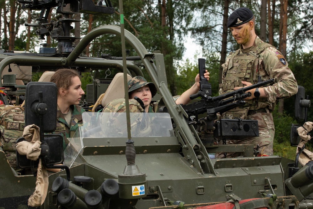 Task Force Ivy, NATO soldiers familiarize junior cadets with military equipment during Baltic Guard