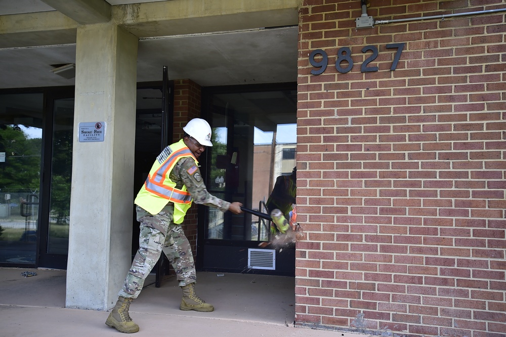 Fort Meade Garrison Command Team Honors Sgt. Clarence Leon ‘Boone’ McNeill with Ceremonial Demolition of McNeill Hall