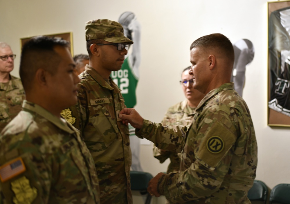 BG Siekman promotes soldier during Guam Wellness IRT