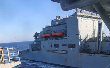 USS Carter Hall, USNS Medgar Evers conduct a replenishment-at-sea