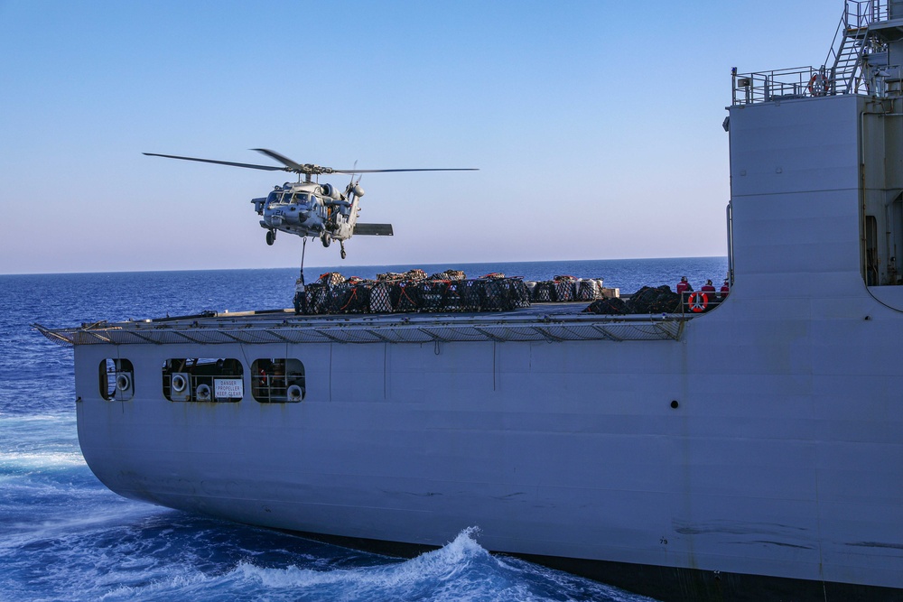USS Carter Hall, USNS Medgar Evers conduct a replenishment-at-sea