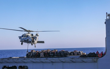 USS Carter Hall, USNS Medgar Evers conduct a replenishment-at-sea