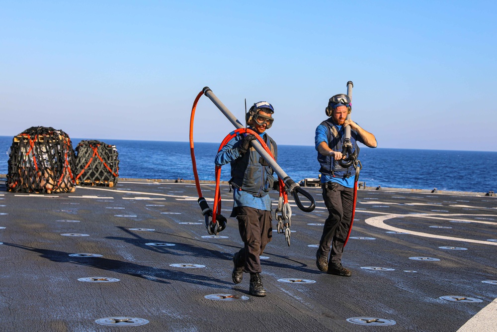 USS Carter Hall, USNS Medgar Evers conduct replenishment at sea