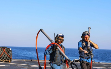 USS Carter Hall, USNS Medgar Evers conduct replenishment at sea