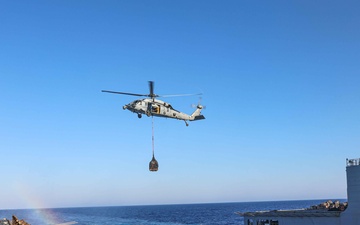 USS Carter Hall, USNS Medgar Evers conduct replenishment at sea