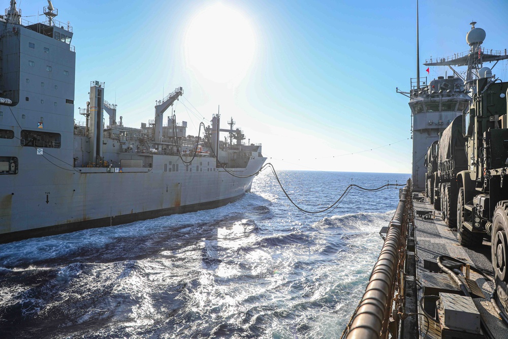 USS Carter Hall, USNS Medgar Evers conduct replenishment at sea