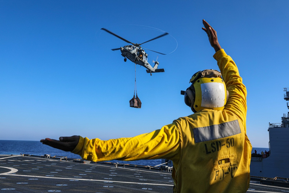 USS Carter Hall, USNS Medgar Evers conduct replenishment at sea