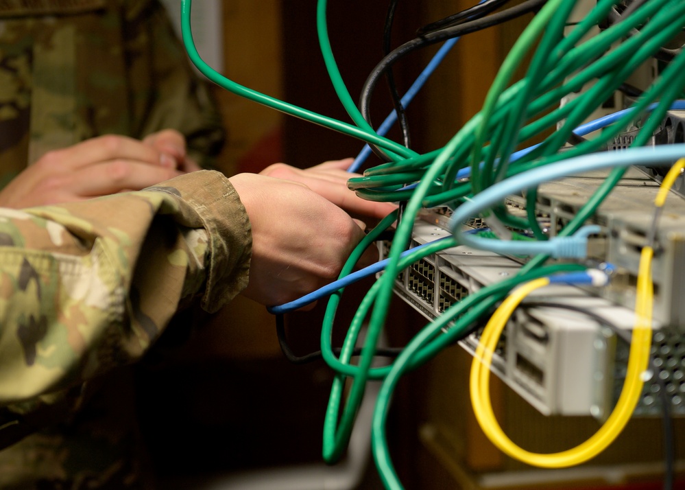 132d Comm Flight Members Assist 86th Communications Squadron with Equipment Replacement