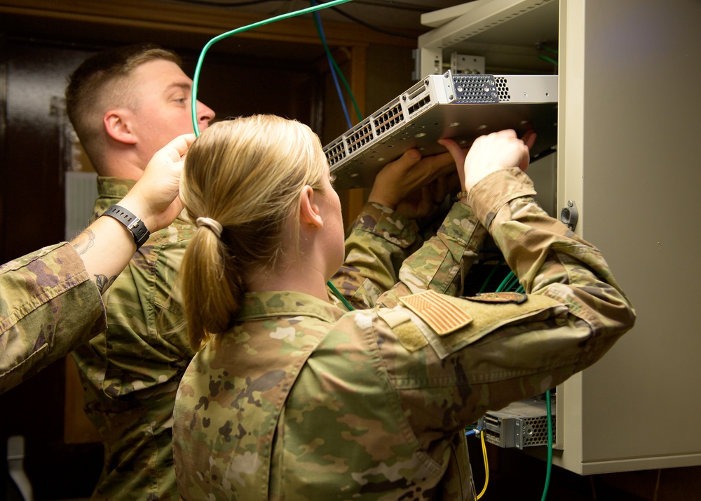 132d Comm Flight Members Assist 86th Communications Squadron with Equipment Replacement