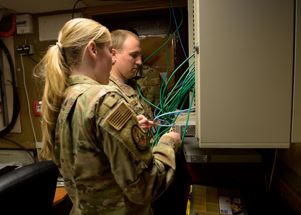 132d Comm Flight Members Assist 86th Communications Squadron with Equipment Replacement