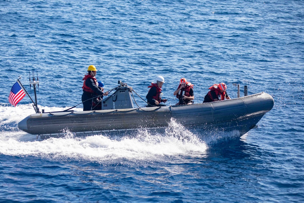Sailors Operate RHIB