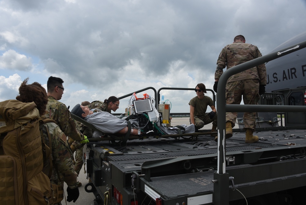 185th ARW simulated patient gets loaded onto aircraft