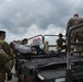 185th ARW simulated patient gets loaded onto aircraft