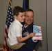 Chief Master Sergeant Zachary Terry hugs his son