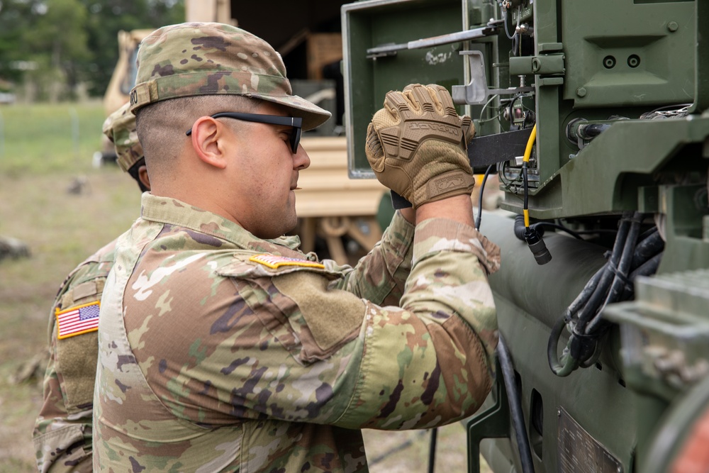 1-258 Field Artillery Test Their Radio Communications Before Northern Strike 23