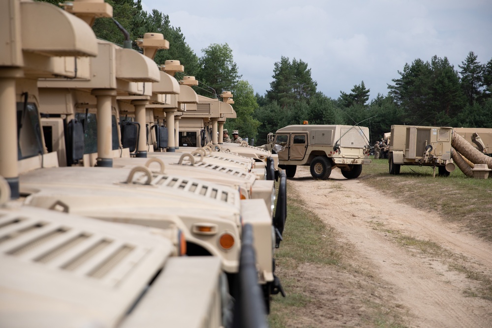 205th Medical Company Ground Ambulance set up a tent during Northern Strike.