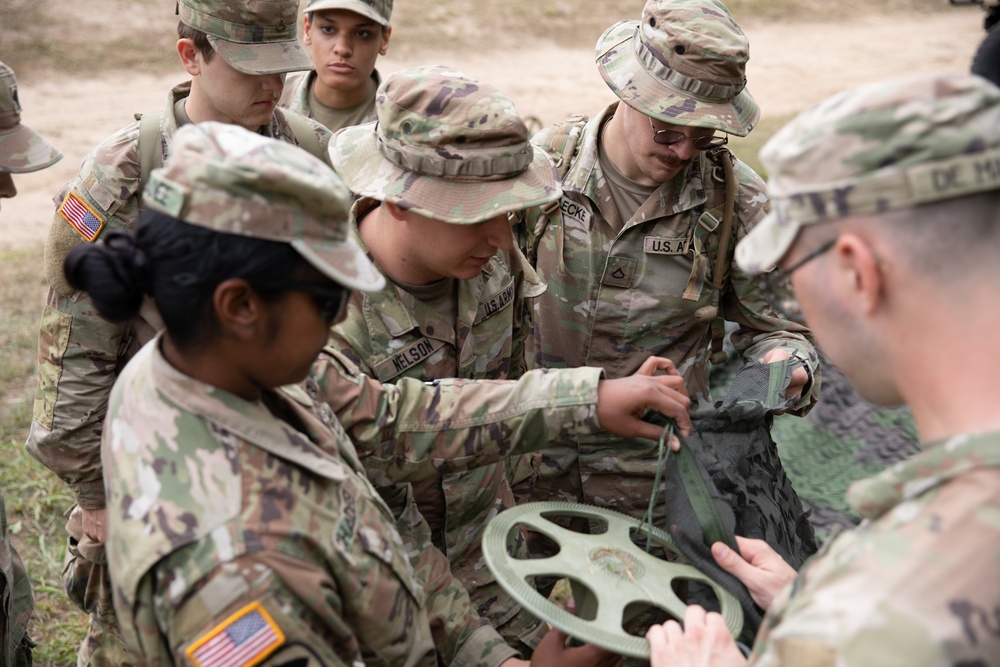 205th Medical Company Ground Ambulance set up a tent during Northern Strike.